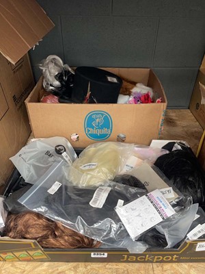 Lot 3354 - 2 trays containing wigs and hair extensions,...