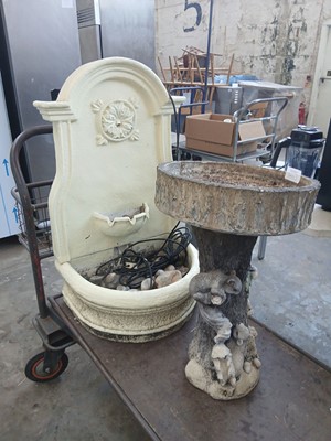 Lot 709 - Water feature and a bird table