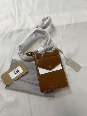 Lot 3732 - Charles & Keith chocolate mini phone bag with...