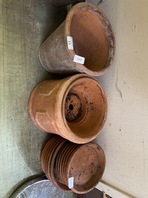 Lot 11 - Various terra cotta garden pots and saucers