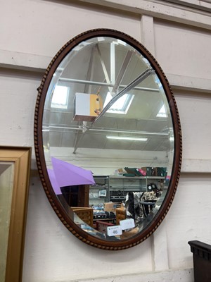 Lot 46 - Oval wooden framed beveled mirror
