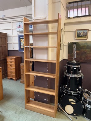 Lot 60 - Waxed pine open bookcase