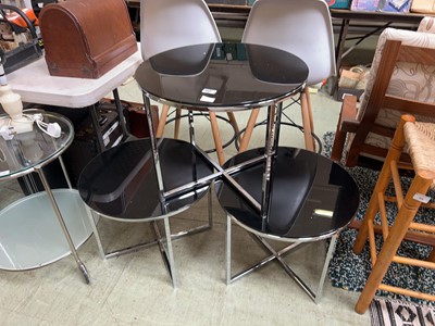 Lot 97 - 3 black glass and chrome circular side tables