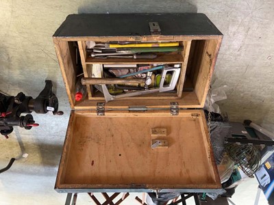 Lot 141 - A wooden vintage tool chest with hand tools