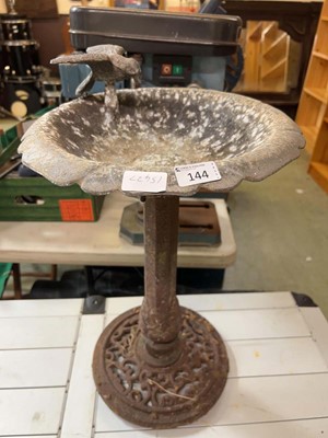Lot 144 - A metal bird bath