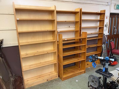 Lot 159 - Four assorted waxed pine book cases and shelves