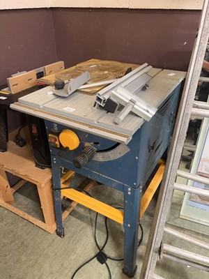 Lot 165 - A Totaba table saw with spare blades