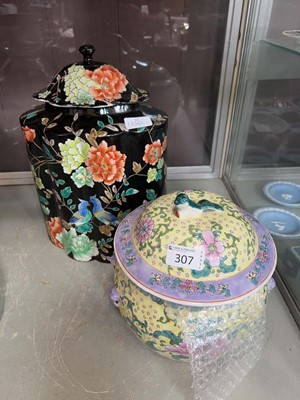 Lot 307 - Two ceramic jars with lids