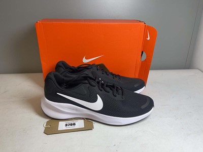 Lot 3796 - Nike UK10 revolution 7 trainers in black /...