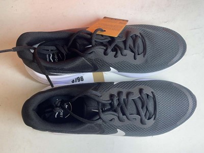 Lot 3796 - Nike UK10 revolution 7 trainers in black /...