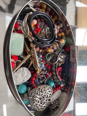 Lot 398 - Tin containing various dress jewellery