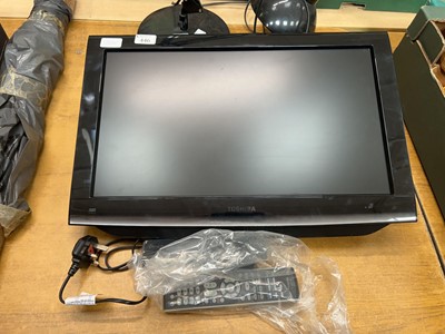 Lot 446 - Toshiba 22 inch TV with wall bracket and remote