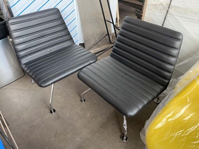 Lot 50 - 2 Leather low-level lounge chairs with ribbed...
