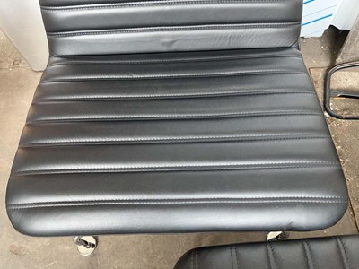 Lot 50 - 2 Leather low-level lounge chairs with ribbed...