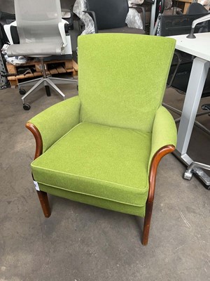 Lot 128 - Parker Knoll green upholstered armchair on oak...