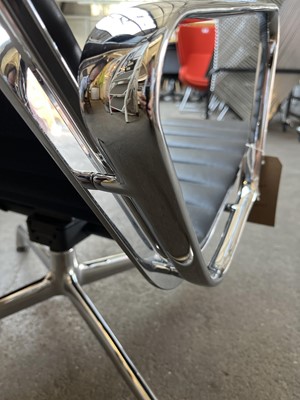 Lot 3 - Charles & Ray Eames for Vitra, an EA124 lounge...