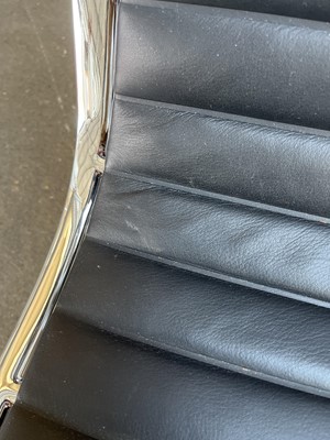 Lot 3 - Charles & Ray Eames for Vitra, an EA124 lounge...