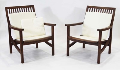 Lot 10 - Pair of walnut executive armchairs designed...