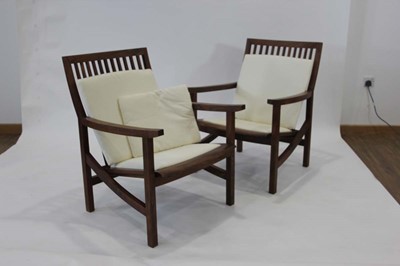 Lot 10 - Pair of walnut executive armchairs designed...