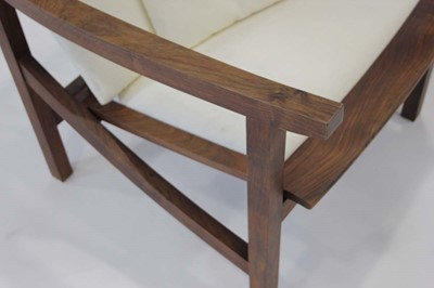 Lot 10 - Pair of walnut executive armchairs designed...