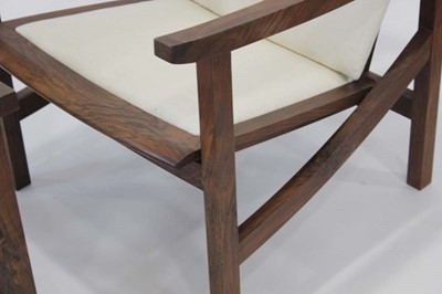Lot 10 - Pair of walnut executive armchairs designed...