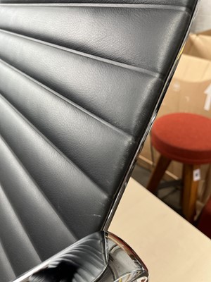 Lot 4 - Charles & Ray Eames for Vitra, an EA124 lounge...