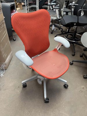 Lot 213 - Herman Miller Mirra chair with orange mesh...