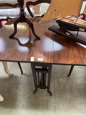 Lot 54 - A modern stained wooden sutherland table