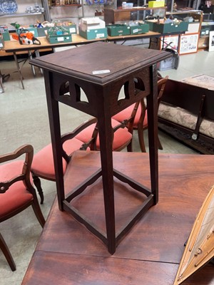 Lot 55 - A 20th Century oak jardinière stand.