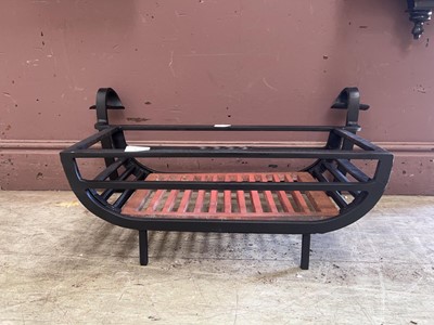 Lot 13 - A modern cast metal black fire grate