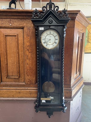 Lot 14 - An ebonized cased drop-dial wall clock
