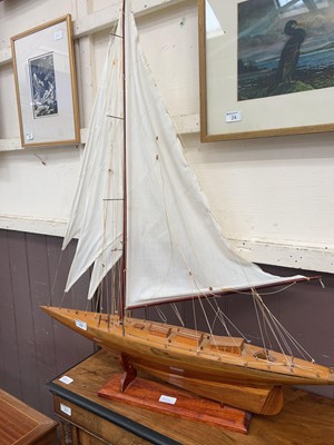 Lot 22 - A hand crafted model of a sailing boat on stand