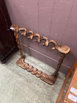 Lot 32 - A modern stained wood stick/umbrella stand...