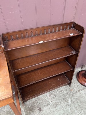 Lot 37 - A stained wood four tier waterfall bookcase