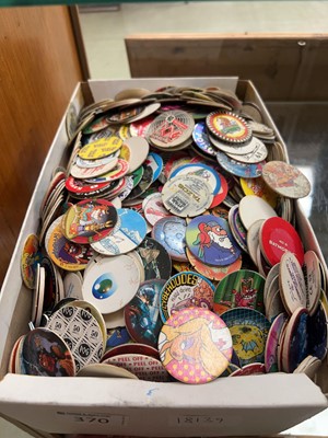 Lot 370 - A carton containing an assortment of pogs...