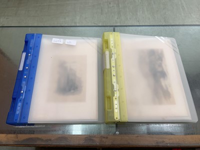 Lot 372 - Two albums containing an assortment of prints,...