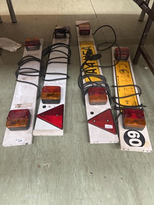 Lot 398 - Four trailer number plate bars with lights -...