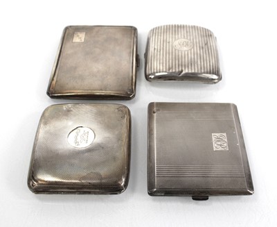 Lot 200 - A group of four silver cigarette cases,...