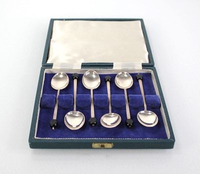 Lot 228 - A cased set of six silver bean spoons,...