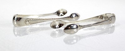 Lot 229 - A pair of silver sugar nips, Sheffield 1921,...