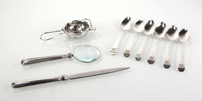 Lot 230 - A set of six George III silver spoons, London...