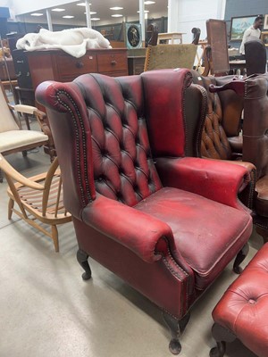Lot 5185 - Wingback Chesterfield armchair with matching...