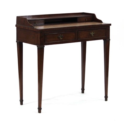 Lot 6 - An early 20th century mahogany writing table,...
