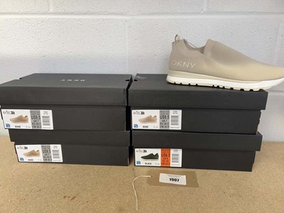 Lot 1907 - x4 boxed pairs of DKNY slip on trainers in...