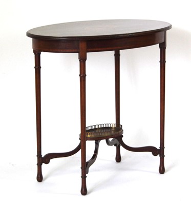 Lot 9 - An Edwardian Sheraton Revival mahogany, walnut...
