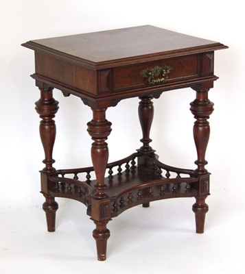 Lot 11 - A late 19th century carved walnut davenport...