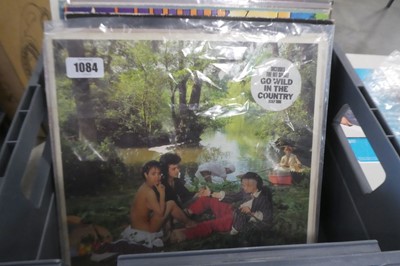 Lot 1084 - Small box of vinyl albums and 12" singles to...