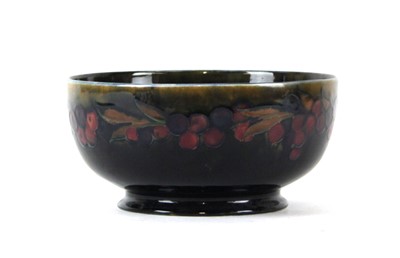 Lot 158 - A William Moorcroft footed bowl decorated in...