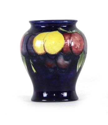 Lot 160 - A William Moorcroft vase of baluster form...