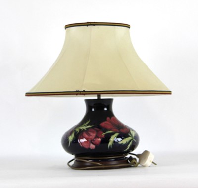 Lot 172 - A Moorcroft table lamp of bulbous form...